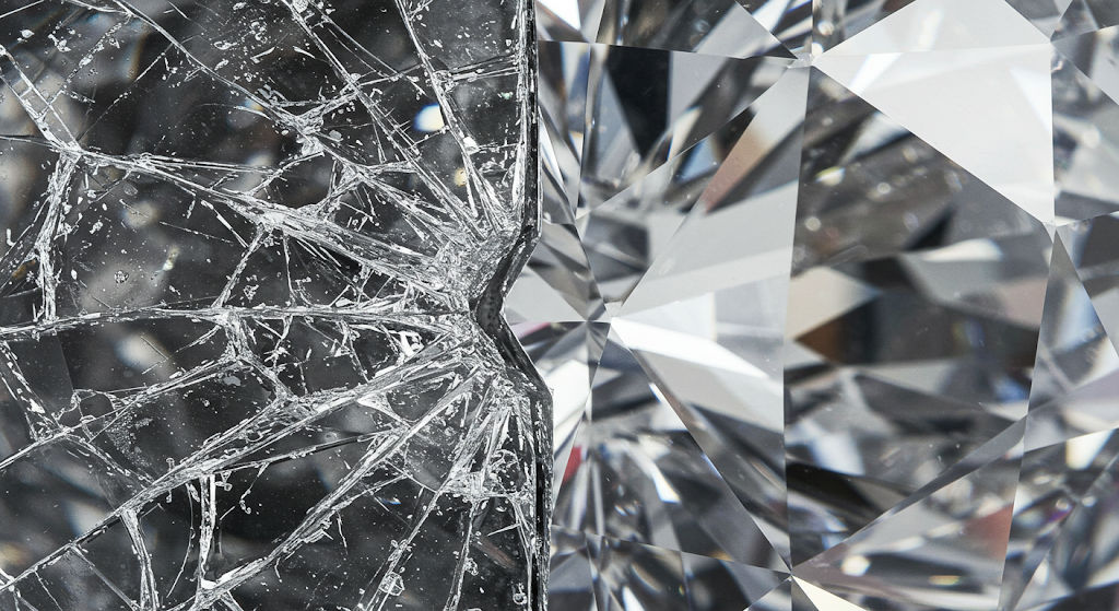 Cracked diamond juxtaposed with a pristine diamond
